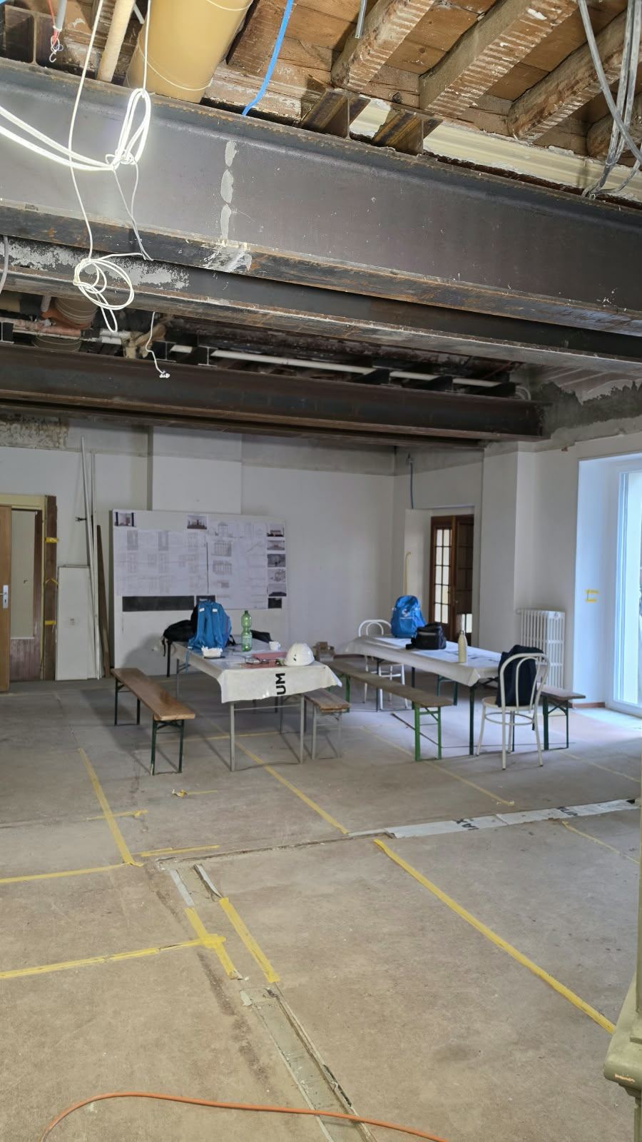 A steel beam installed across the gutted ground floor at SoHome Lausanne