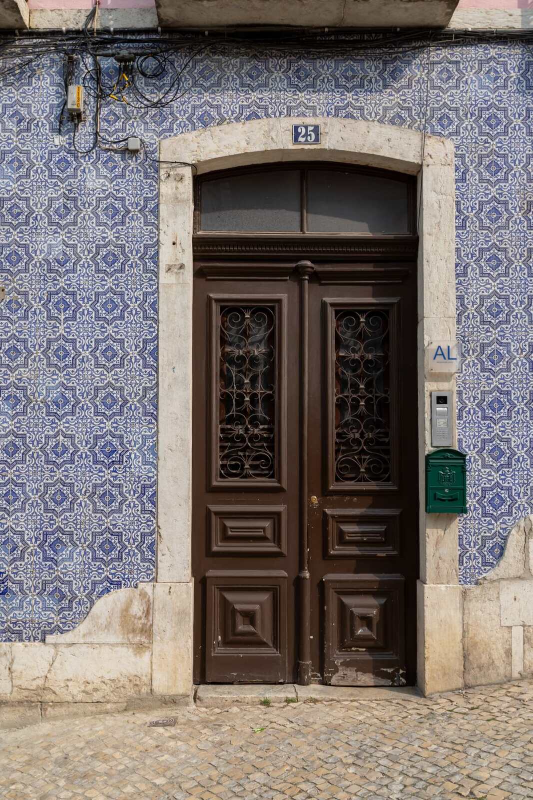 The number 25 door with blue azulejo tiles