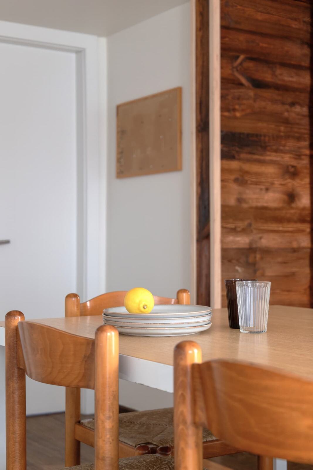 The communal table set for breakfast at SoHome Le Châble