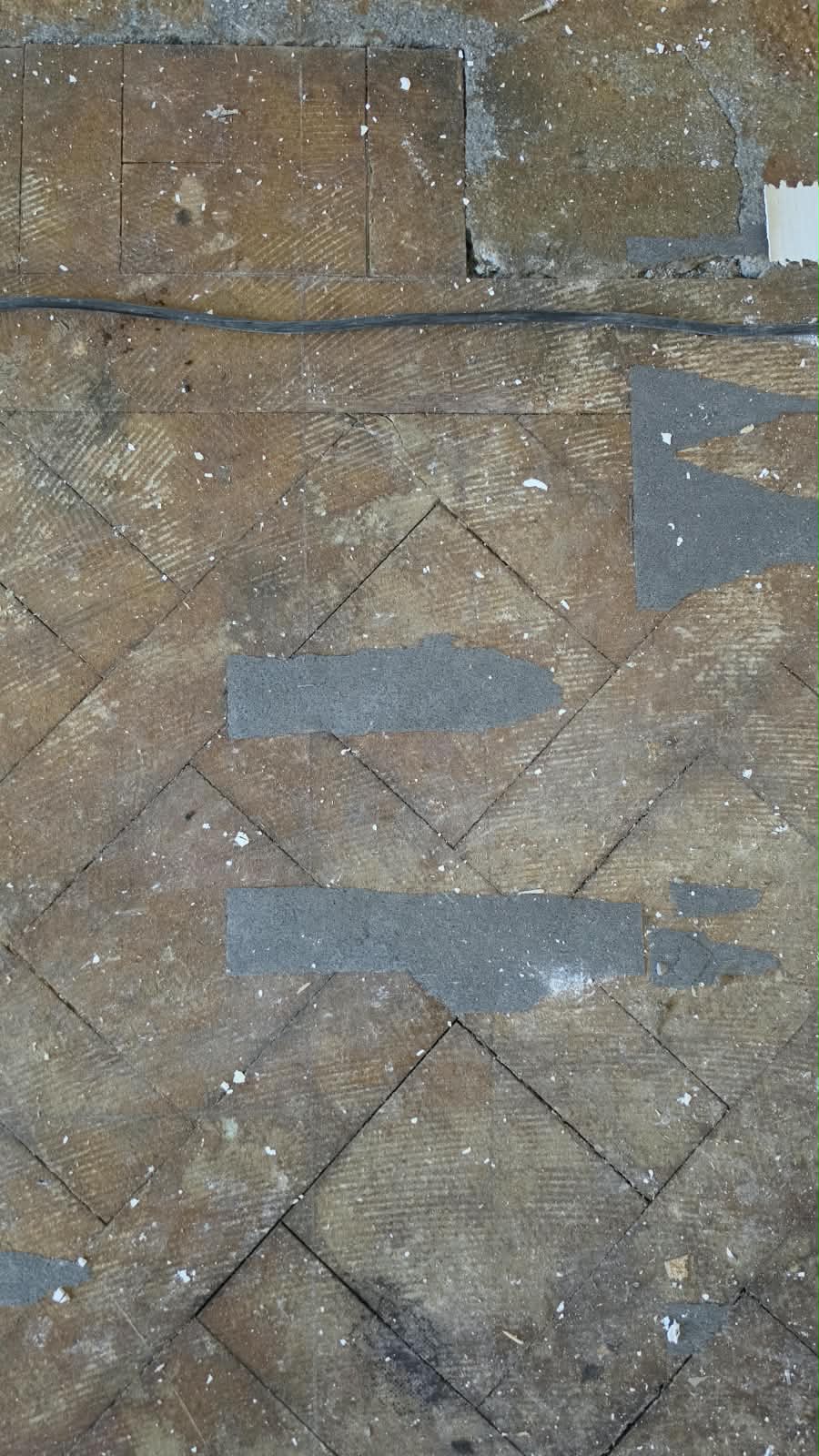 Original parquet and floor borders during the Lausanne renovation