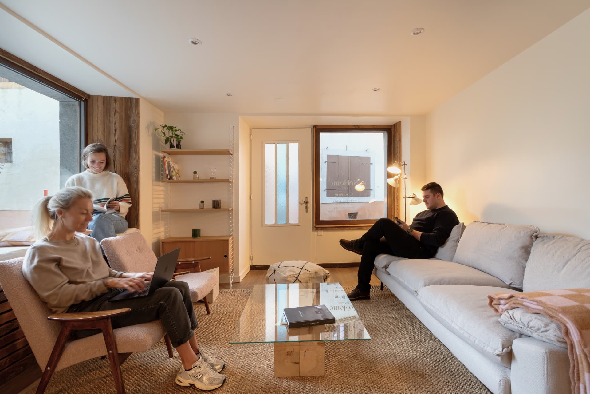 Guests enjoying the shared lounge at SoHome Le Châble