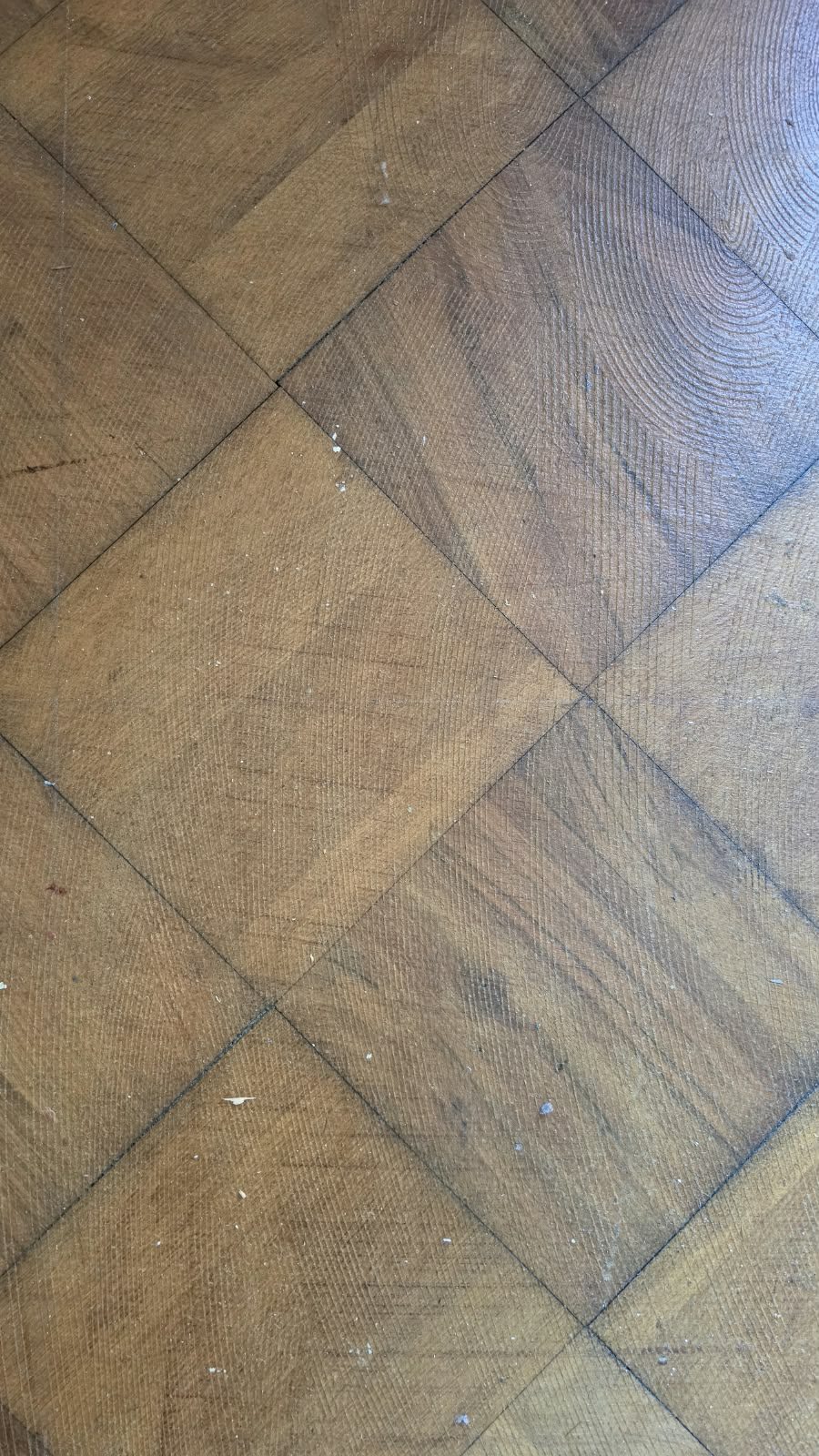 Detail of the original wooden floor at SoHome Lausanne